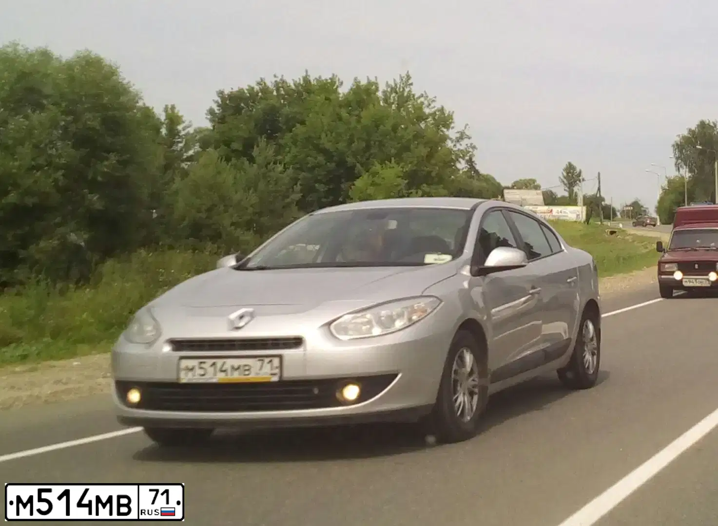 Фото автомобиля RENAULT FLUENCE, 2012 — госномер Т288ХМ71. Цвет: СВЕТЛО-СЕРЫЙ