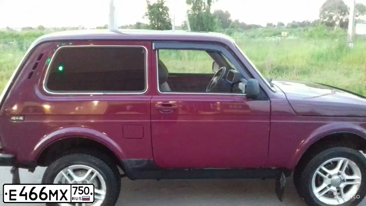 Фото автомобиля LADA 2121 NIVA, 2003 — госномер Е466МХ750. Цвет: ТЕМНО-БОРДОВЫЙ