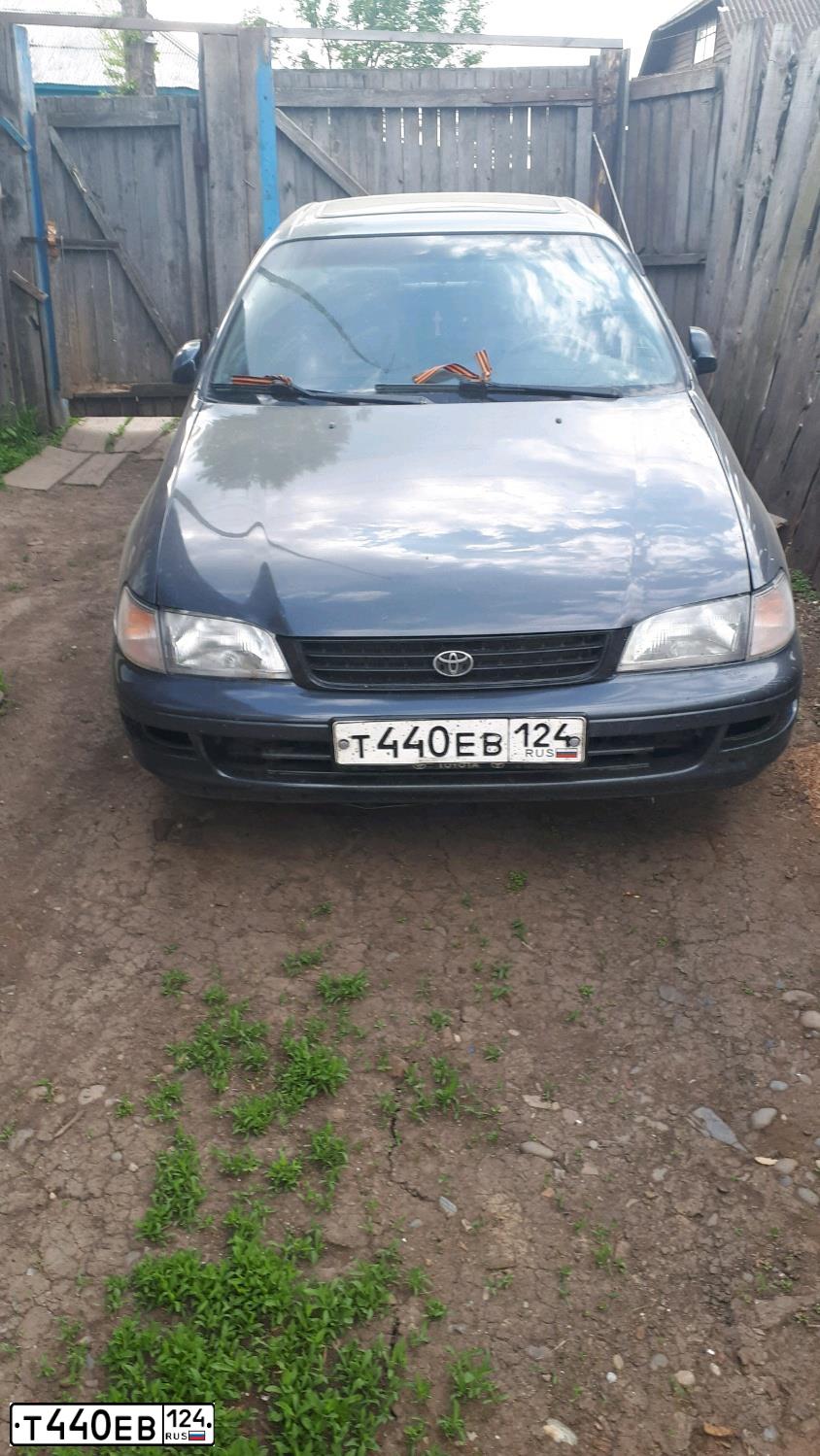 Фото автомобиля TOYOTA CARINA, 1993 — госномер О797ОУ97. Цвет: СЕРЫЙ