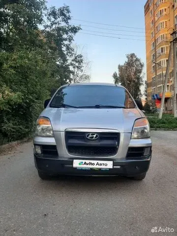 Фото автомобиля HYUNDAI H 1/H 100/STAREX, 2005 — госномер Х279ТХ797. Цвет: ТЕМНО-СЕРЫЙ