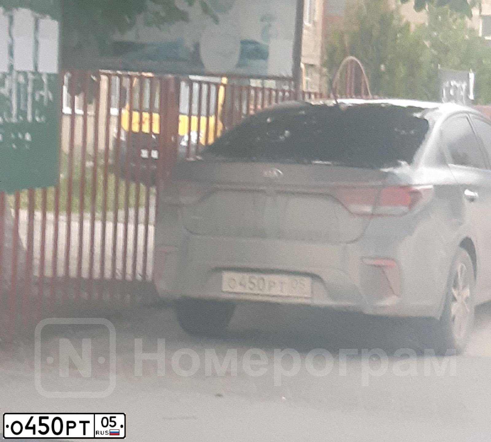 Фото автомобиля KIA RIO, 2019 — госномер О450РТ05. Цвет: Черный