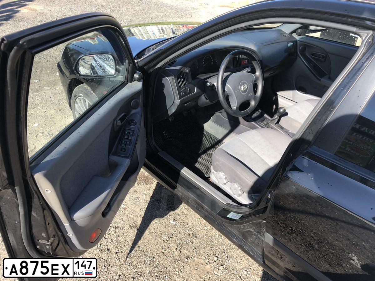 Фото автомобиля HYUNDAI ELANTRA, 2004 — госномер Е928ТТ69. Цвет: ЧЕРНЫЙ