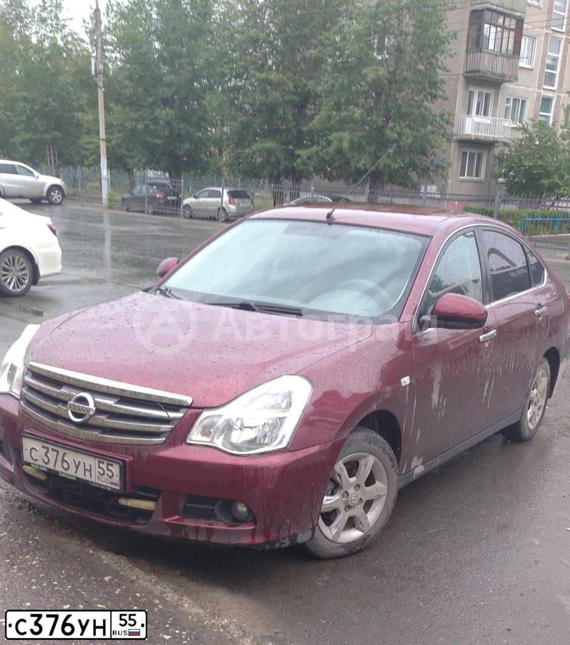 Фото автомобиля NISSAN ALMERA /AVTOVAZ/, 2013 — госномер С376УН55. Цвет: ТЕМНО-КРАСНЫЙ