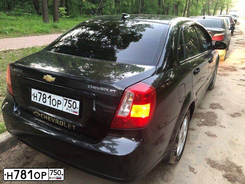 Фото автомобиля CHEVROLET LACETTI, 2007 — госномер М094ОС134. Цвет: ЧЕРНЫЙ