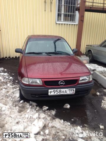 Фото автомобиля OPEL ASTRA, 1998 — госномер Р958НА199. Цвет: ВИШНЕВЫЙ