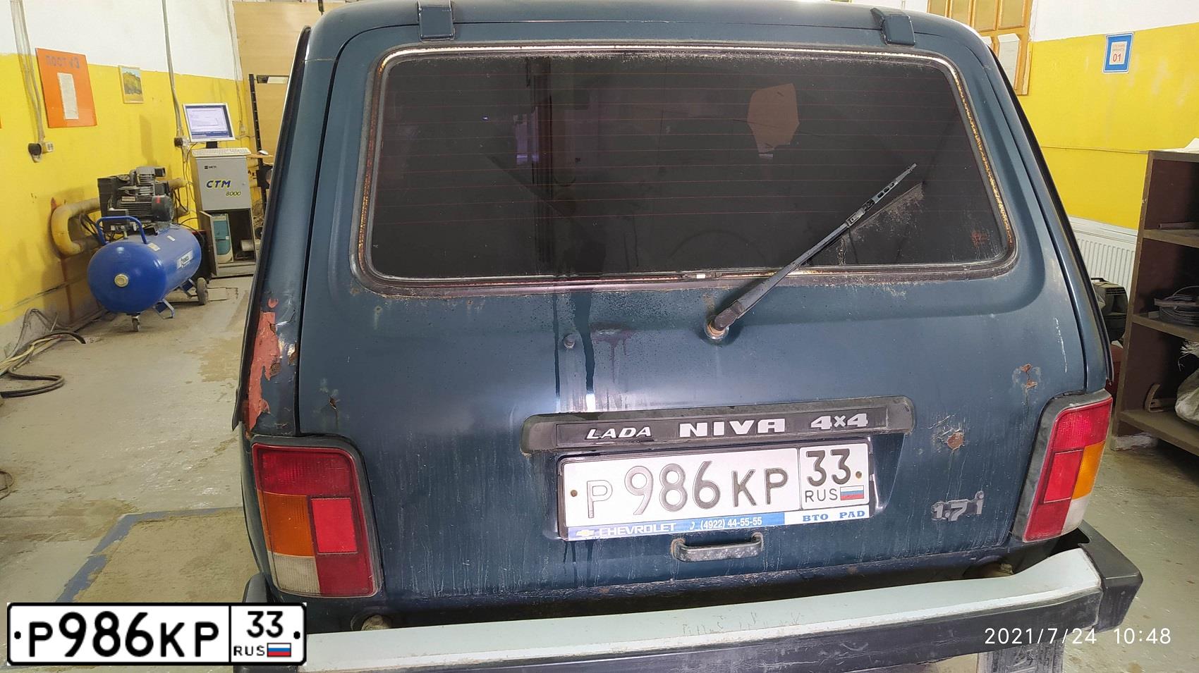 Фото автомобиля ВАЗ 21214, 2002 — госномер Р986КР33. Цвет: сине-зеленый