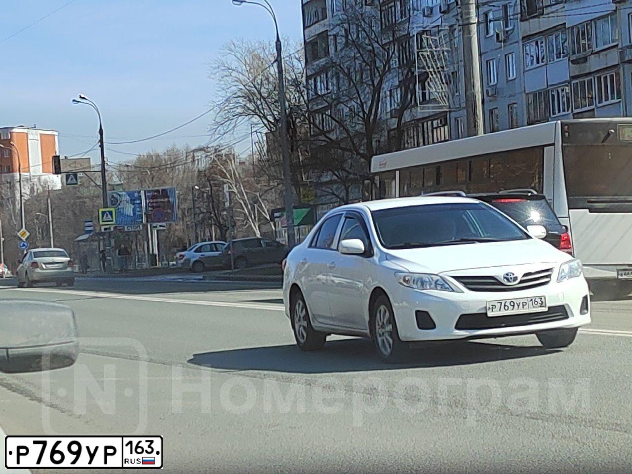 Фото автомобиля TOYOTA COROLLA, 2012 — госномер Р769РУ163. Цвет: Белый