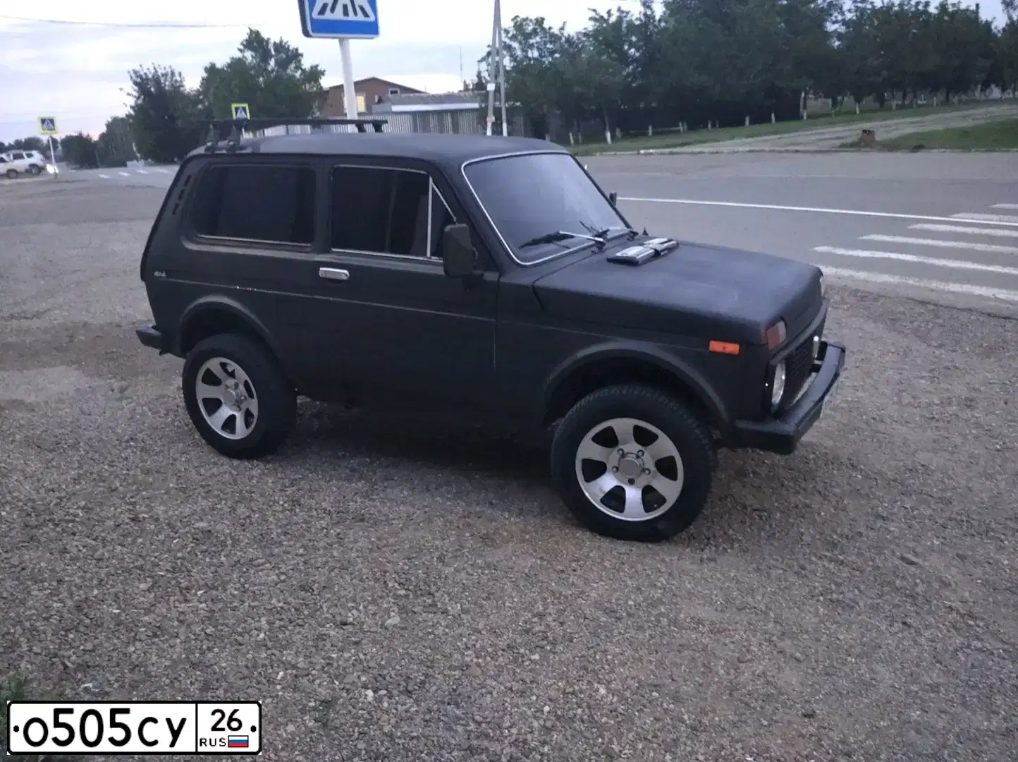 Фото автомобиля LADA 2121 NIVA, 1988 — госномер А228РК01. Цвет: ЧЕРНЫЙ