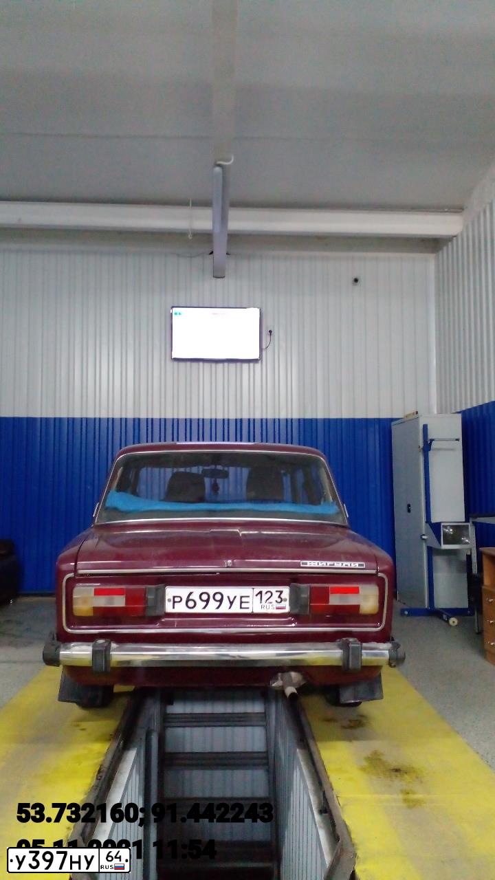 Фото автомобиля LADA 2106, 2004 — госномер Т600КУ30. Цвет: ТЕМНО-КРАСНЫЙ