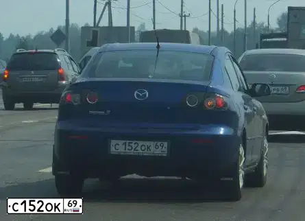 Фото автомобиля MAZDA 3, 2008 — госномер Е494РК761. Цвет: синий