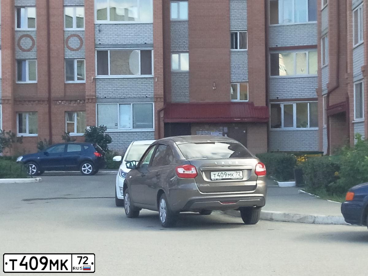 Фото автомобиля LADA 2191 GRANTA, 2019 — госномер Т409МК72. Цвет: Коричневый