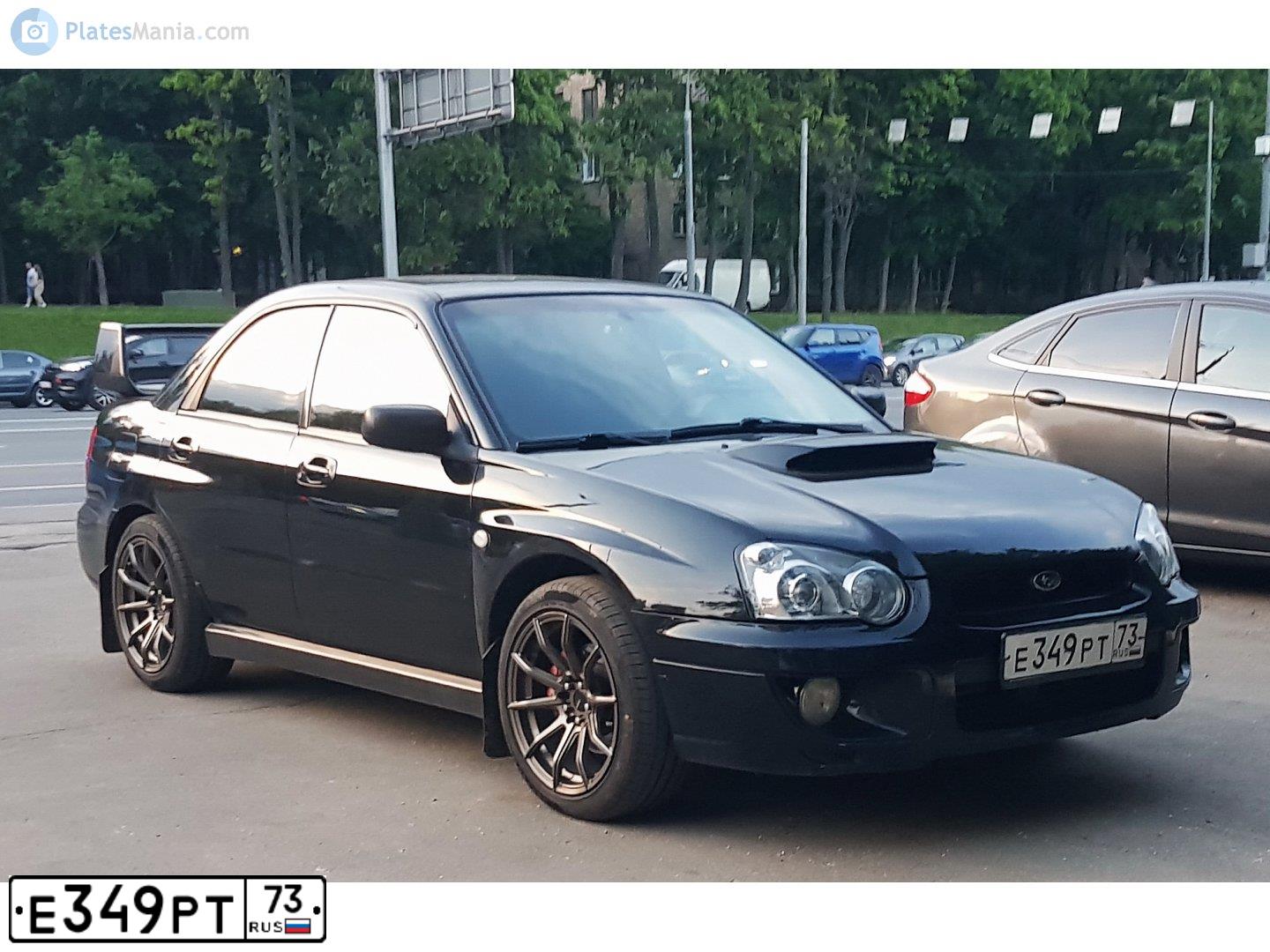 Фото автомобиля SUBARU IMPREZA, 2004 — госномер Е349РТ73. Цвет: ЧЕРНЫЙ