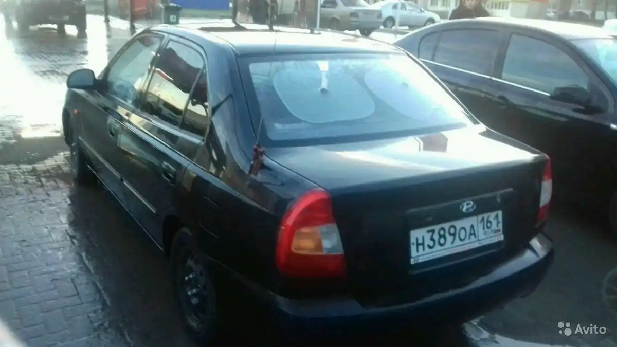 Фото автомобиля TAGAZ ACCENT, 2005 — госномер Е090РО161. Цвет: ЧЕРНЫЙ