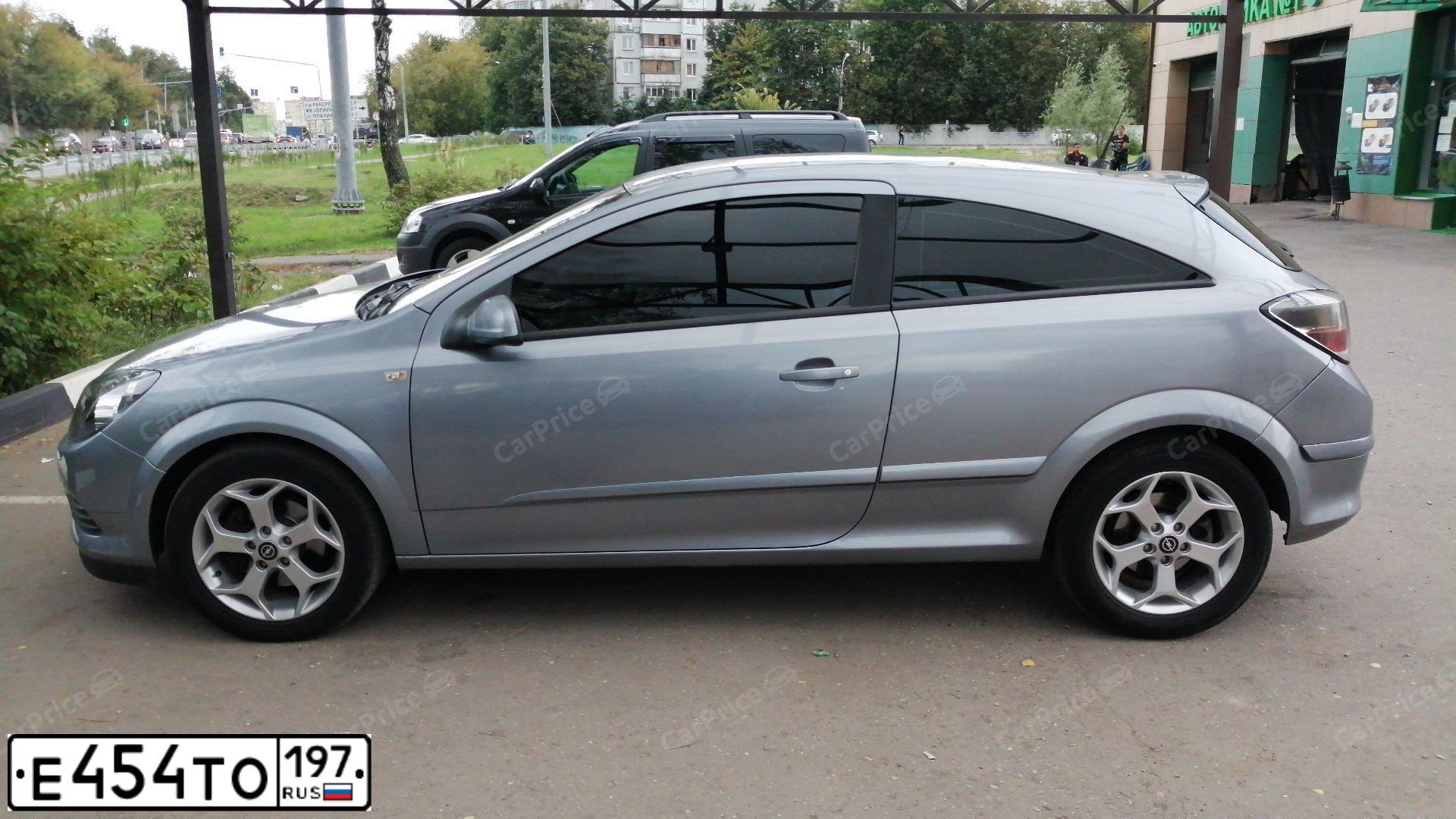 Фото автомобиля OPEL ASTRA, 2008 — госномер Е454ТО197. Цвет: СЕРЫЙ