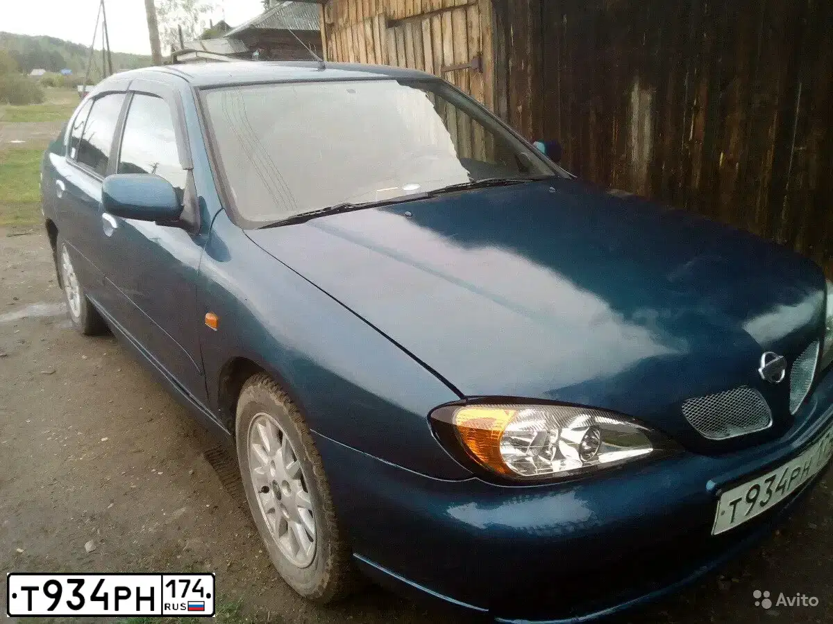 Фото автомобиля NISSAN PRIMERA, 2001 — госномер Т934РН174. Цвет: синий
