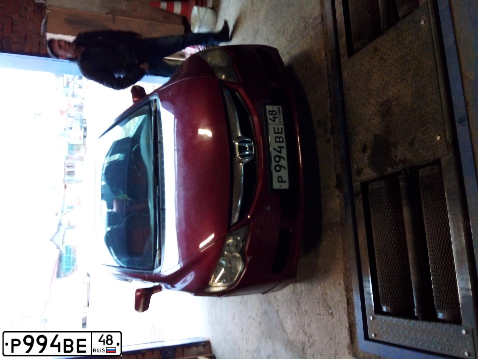 Фото автомобиля HONDA CIVIC, 2010 — госномер Р994ВЕ48. Цвет: ТЕМНО-КРАСНЫЙ