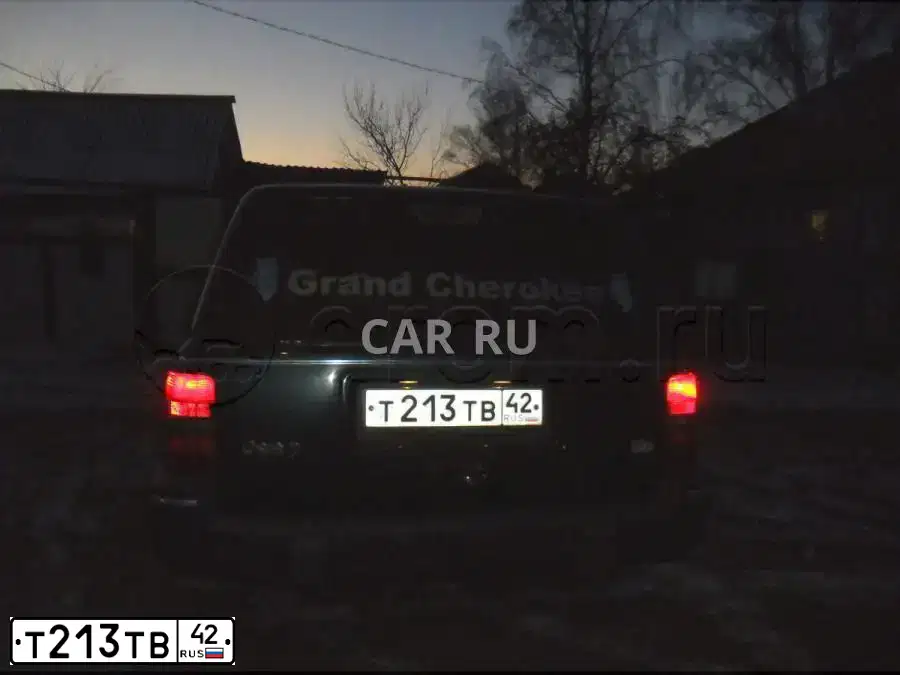 Фото автомобиля JEEP GRAND CHEROKEE, 1994 — госномер Т213ТВ42. Цвет: ЗЕЛЕНЫЙ