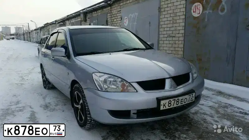 Фото автомобиля MITSUBISHI LANCER, 2007 — госномер К878ЕО73. Цвет: СЕРЫЙ СВЕТЛЫЙ