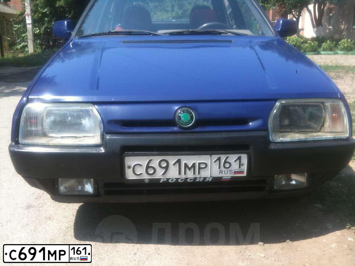 Фото автомобиля SKODA FAVORIT, 1994 — госномер С691МР161. Цвет: ФИОЛЕТОВЫЙ