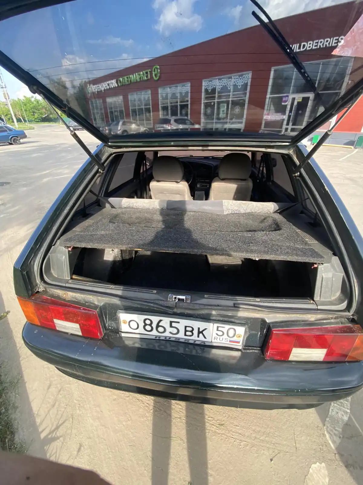 Фото автомобиля LADA 2114 SAMARA, 2003 — госномер С937ВН46. Цвет: Темно-зеленый
