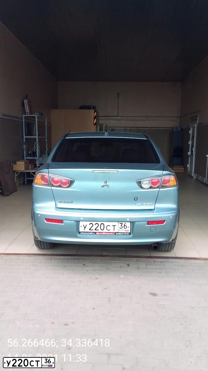 Фото автомобиля MITSUBISHI LANCER, 2010 — госномер У750ТХ69. Цвет: СВЕТЛО-СЕРО-ЗЕЛЕНЫЙ