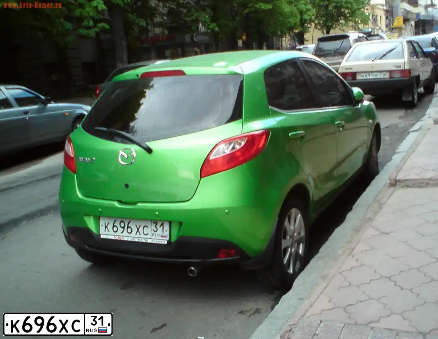 Фото автомобиля MAZDA 2, 2008 — госномер К696ХС31. Цвет: ЗЕЛЕНЫЙ