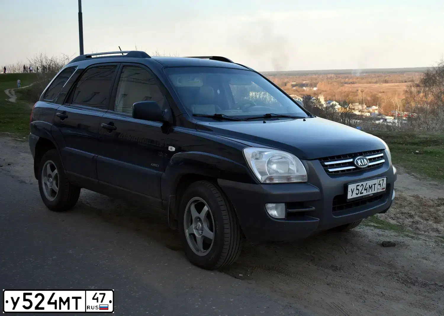 Фото автомобиля KIA SPORTAGE, 2007 — госномер У524МТ47. Цвет: ЧЕРНЫЙ