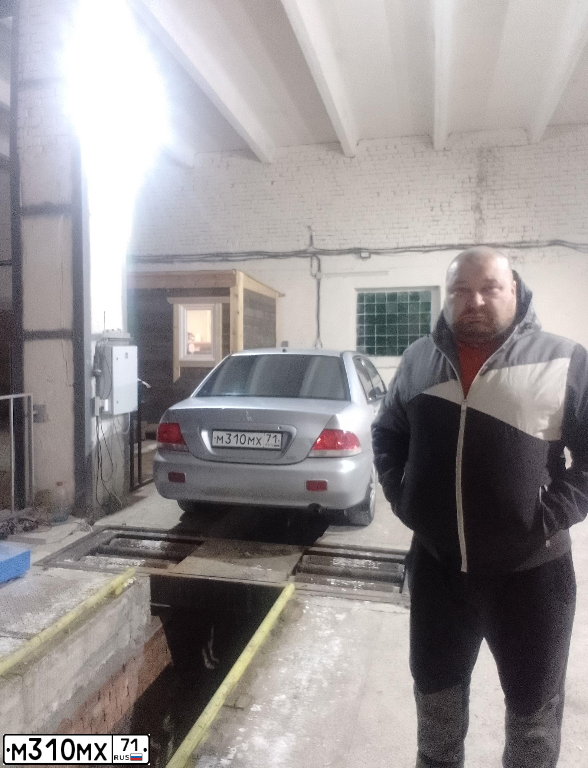 Фото автомобиля MITSUBISHI LANCER, 2005 — госномер У745ТС71. Цвет: Серебристый