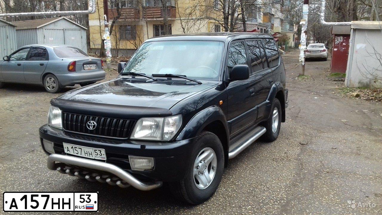 Фото автомобиля TOYOTA LANDCRUISER, 2001 — госномер Х424СА123. Цвет: ЧЕРНЫЙ