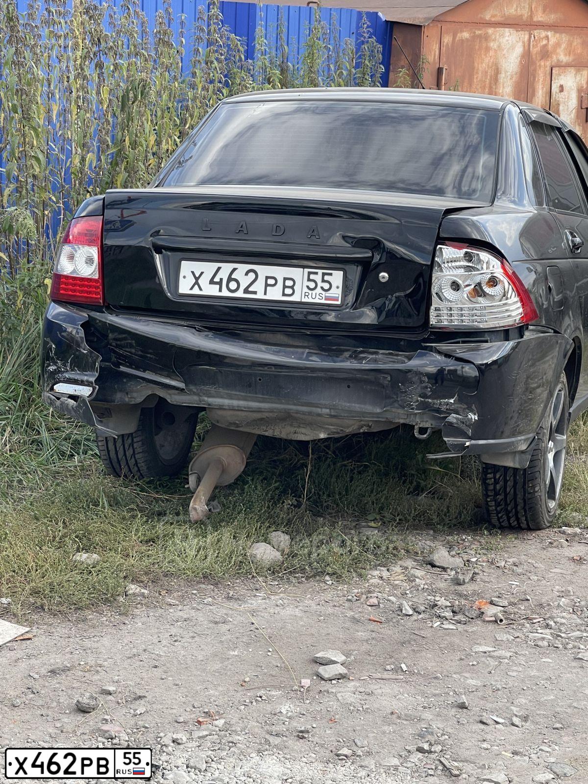 Фото автомобиля ЛАДА 217030 LADA PRIORA, 2011 — госномер Х939УО55. Цвет: Сине-Черный