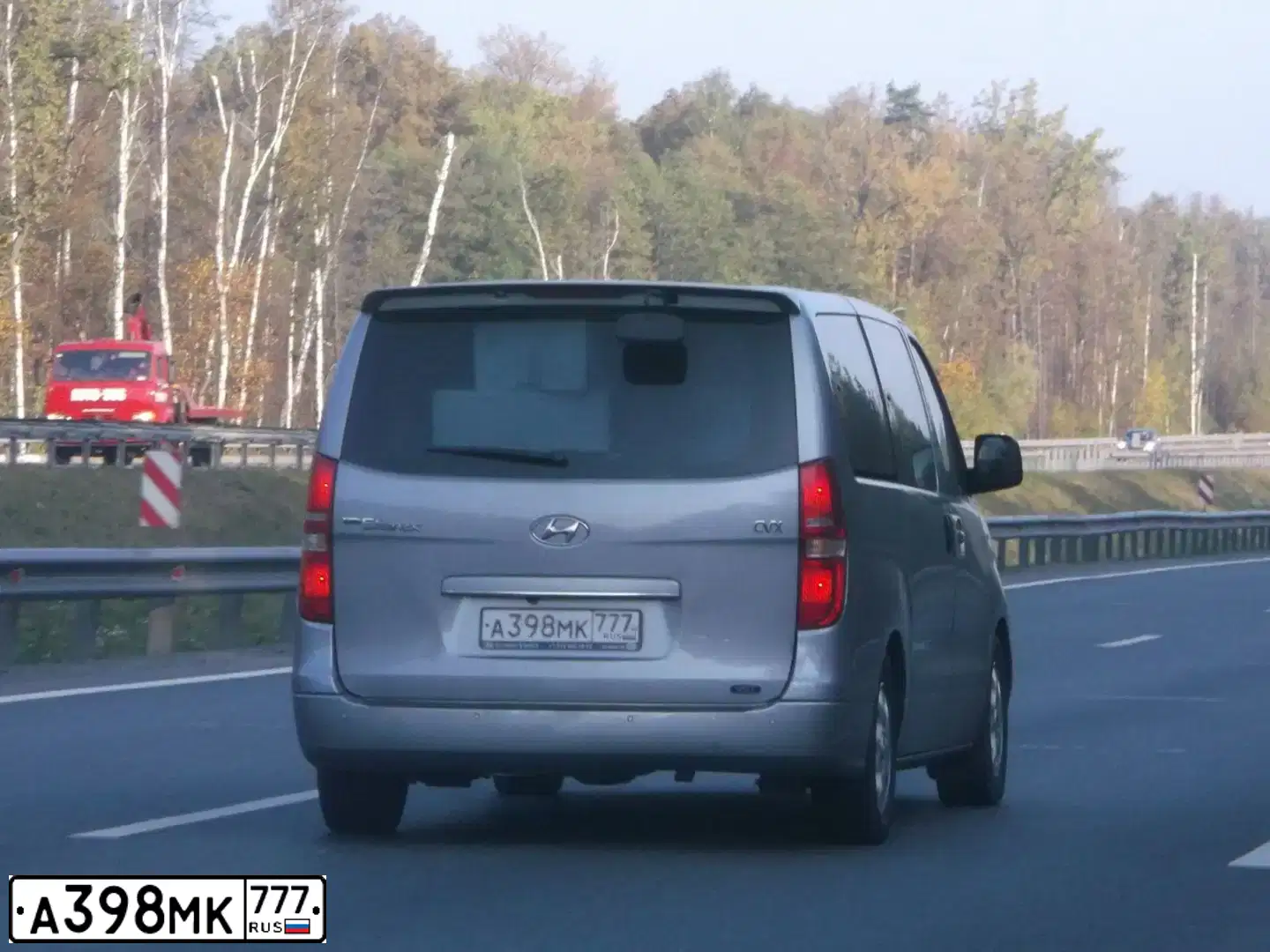 Фото автомобиля HYUNDAI GRAND STAREX, 2011 — госномер А398МК777. Цвет: Серый