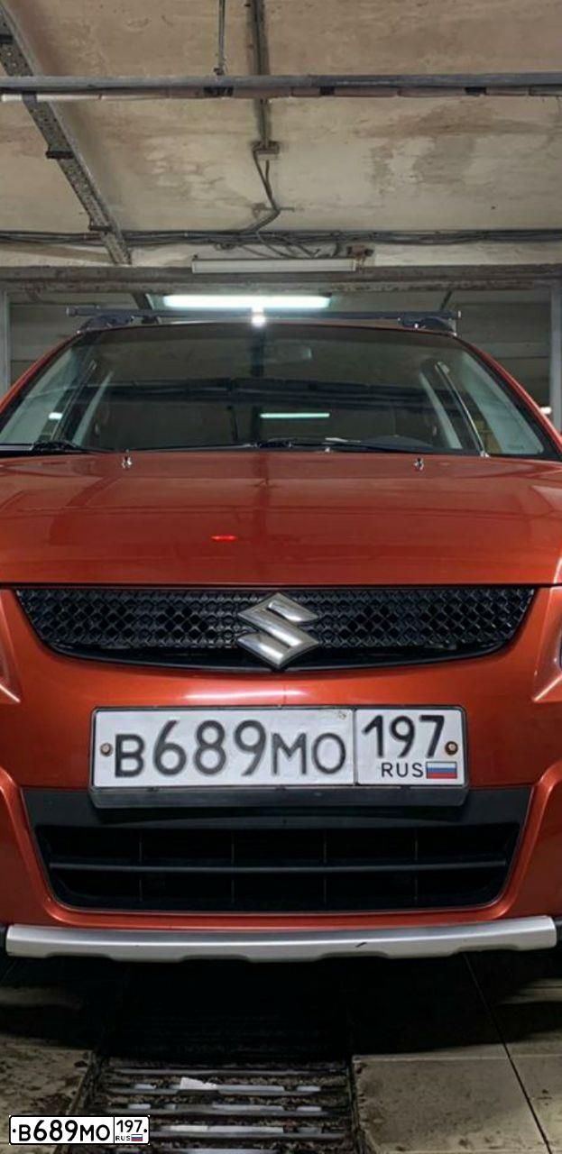Фото автомобиля SUZUKI SX 4, 2010 — госномер У366СС71. Цвет: Оранжевый