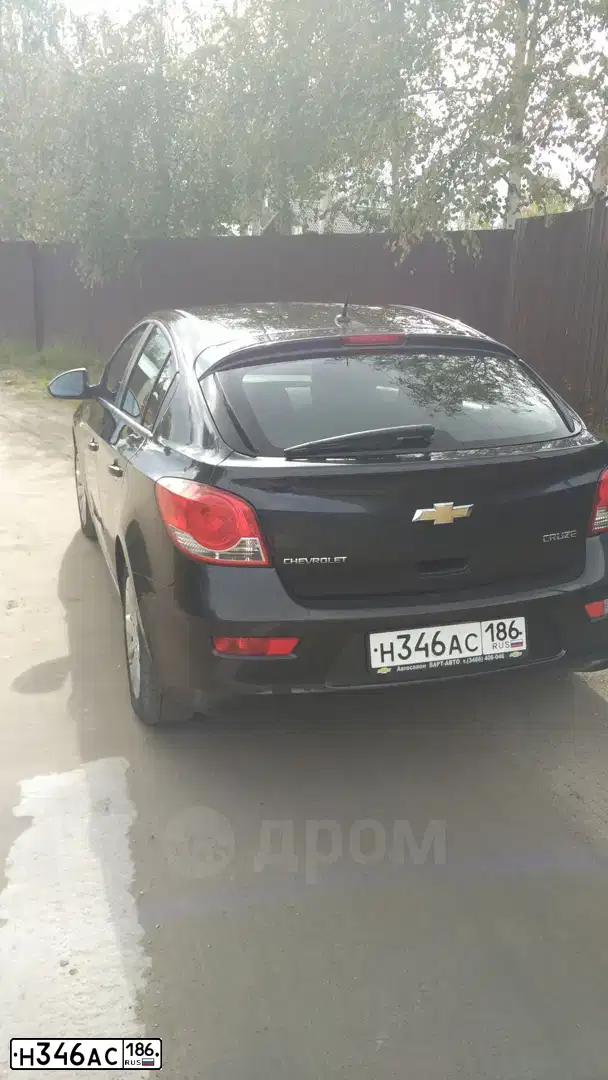 Фото автомобиля CHEVROLET CRUZE, 2013 — госномер Н346АС186. Цвет: ЧЕРНЫЙ МЕТАЛЛИК