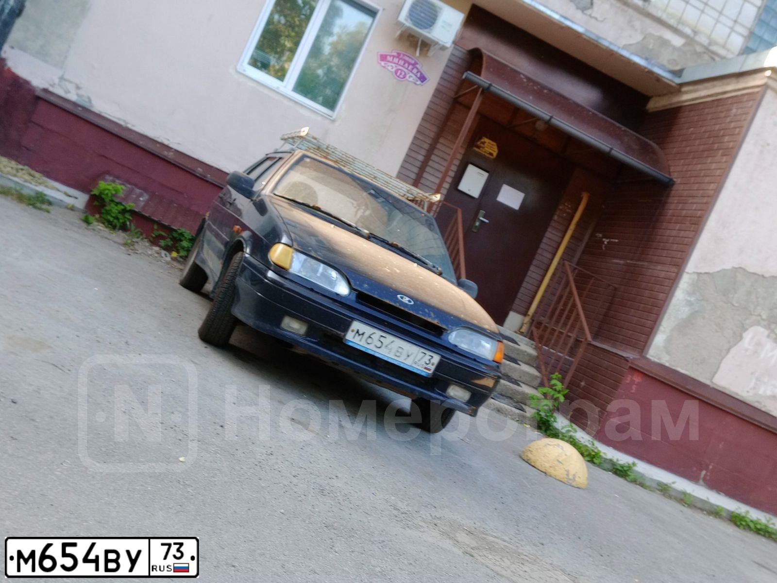 Фото автомобиля LADA 2114 SAMARA, 2010 — госномер М654ВУ73. Цвет: СИНЕ-ЧЕРНЫЙ