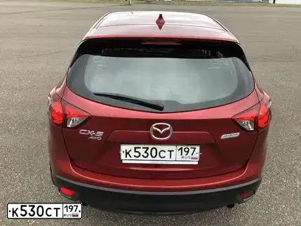 Фото автомобиля MAZDA CX-5, 2011 — госномер О649ОР124. Цвет: Красный