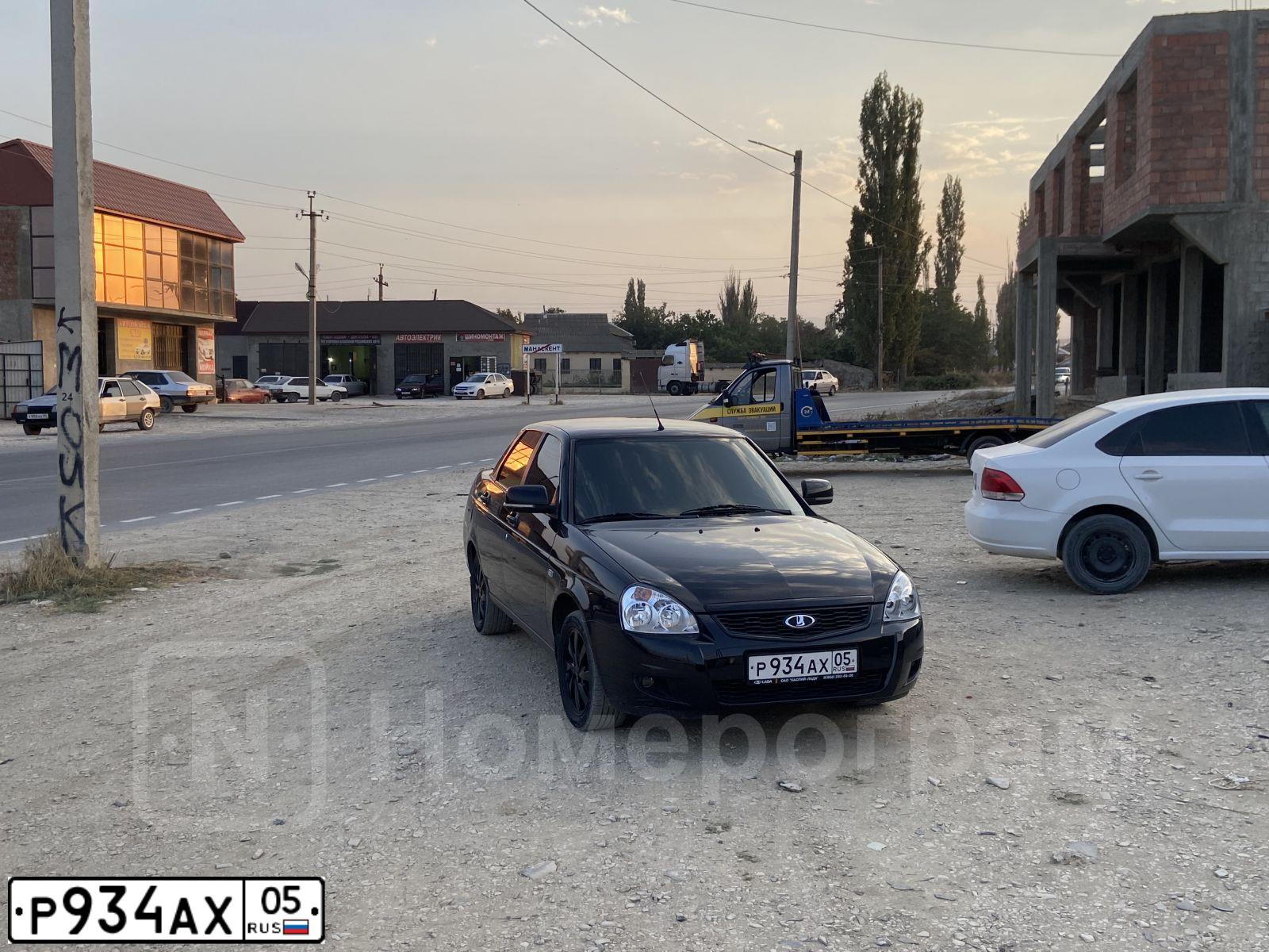 Фото автомобиля LADA 2170 PRIORA, 2015 — госномер Р934АХ05. Цвет: Сине-Черный