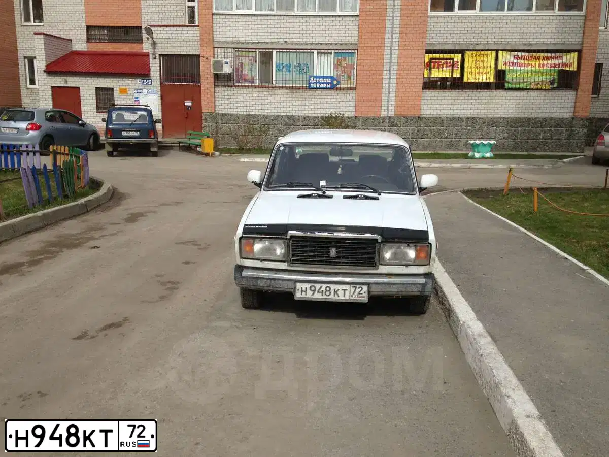 Фото автомобиля LADA 2107, 2007 — госномер Н948КТ72. Цвет: БЕЛЫЙ