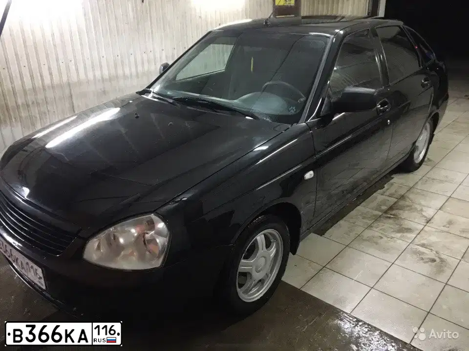 Фото автомобиля LADA 2172 PRIORA, 2010 — госномер Н194ХС73. Цвет: СИНЕ-ЧЕРНЫЙ