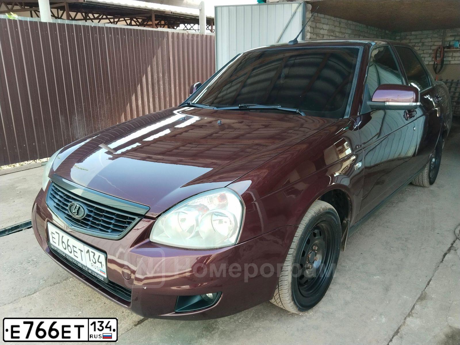 Фото автомобиля LADA 2170 PRIORA, 2013 — госномер Е766ЕТ134. Цвет: ТЕМНО-ВИШНЕВЫЙ