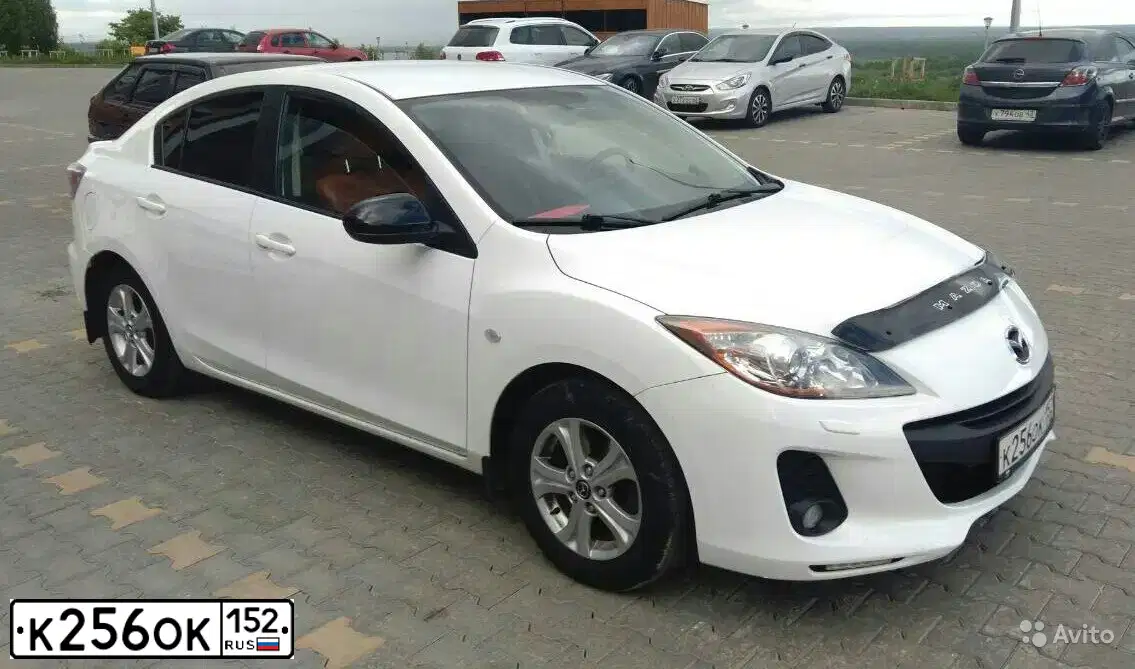 Фото автомобиля MAZDA 3, 2012 — госномер К256ОК152. Цвет: Белый
