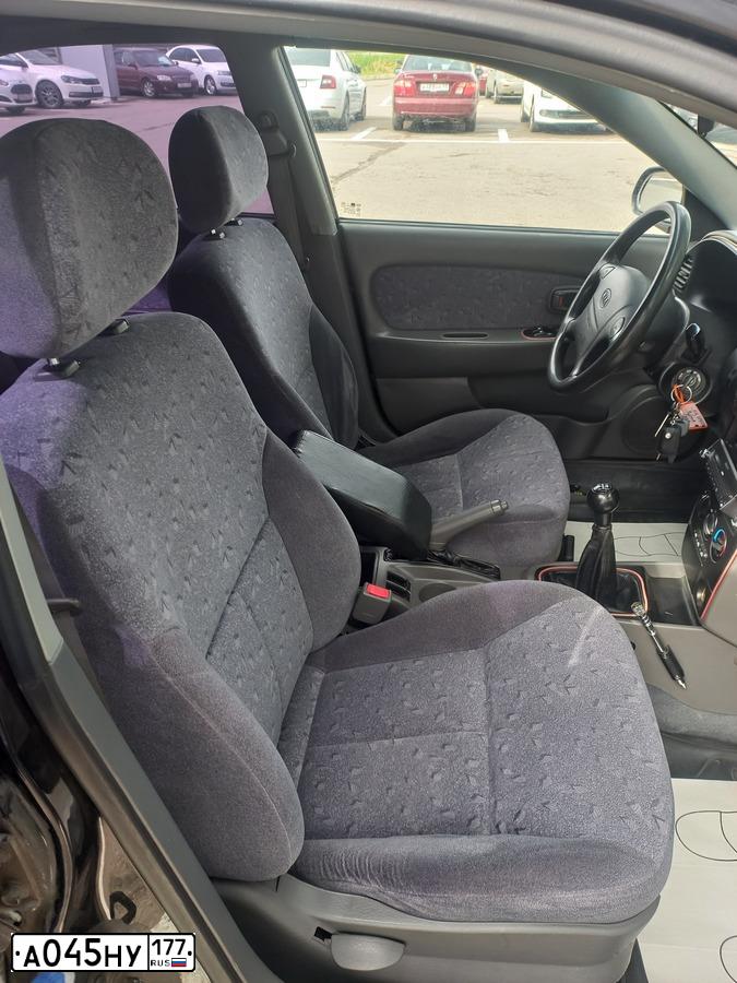 Фото автомобиля KIA SPECTRA, 2006 — госномер Н623АА136. Цвет: ЧЕРНЫЙ