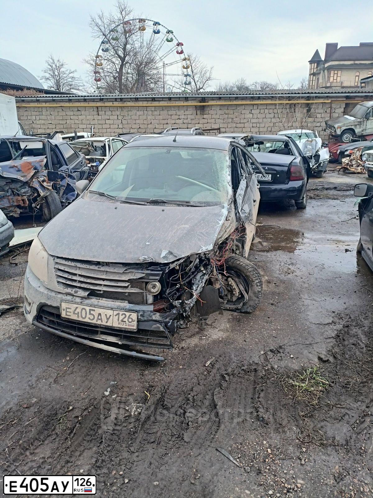 Фото автомобиля LADA 2190 GRANTA, 2018 — госномер Е405АУ126. Цвет: серебристо темно серый