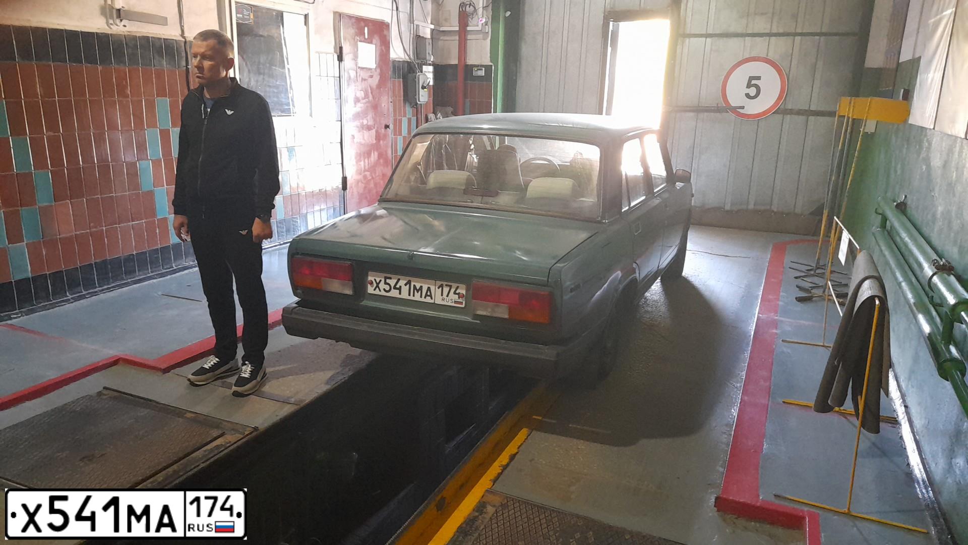 Фото автомобиля LADA 2107, 2004 — госномер Р809НК45. Цвет: ТЕМНО-ЗЕЛЕНЫЙ