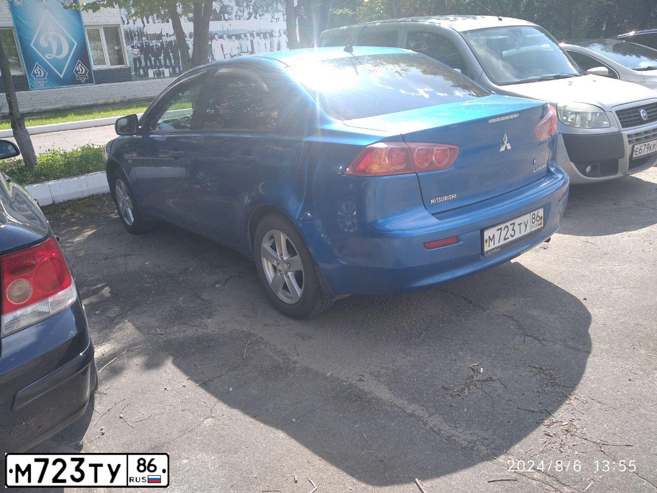 Фото автомобиля MITSUBISHI LANCER, 2008 — госномер М723ТУ86. Цвет: СИНИЙ