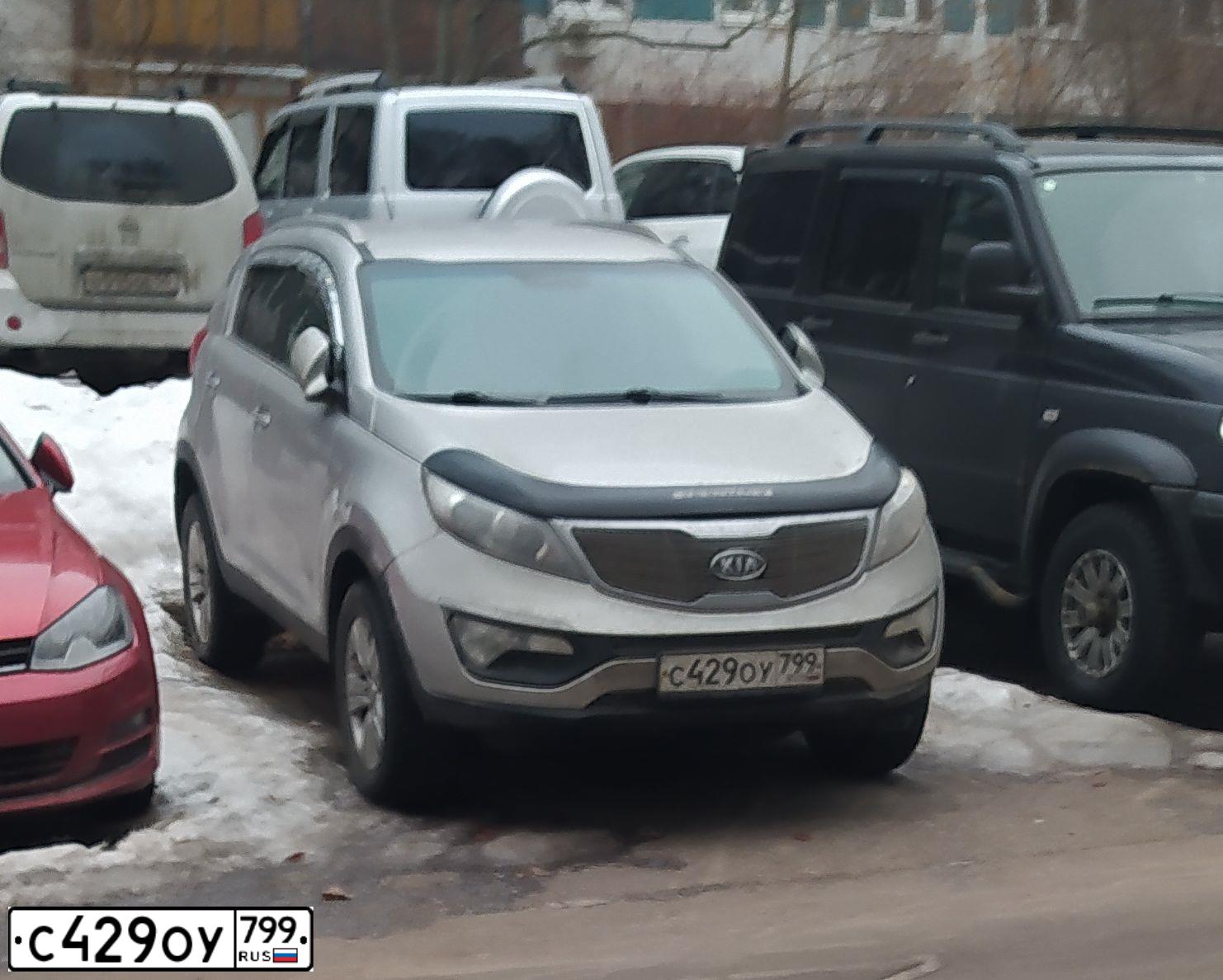 Фото автомобиля KIA SPORTAGE, 2011 — госномер С429ОУ799. Цвет: СЕРЫЙ