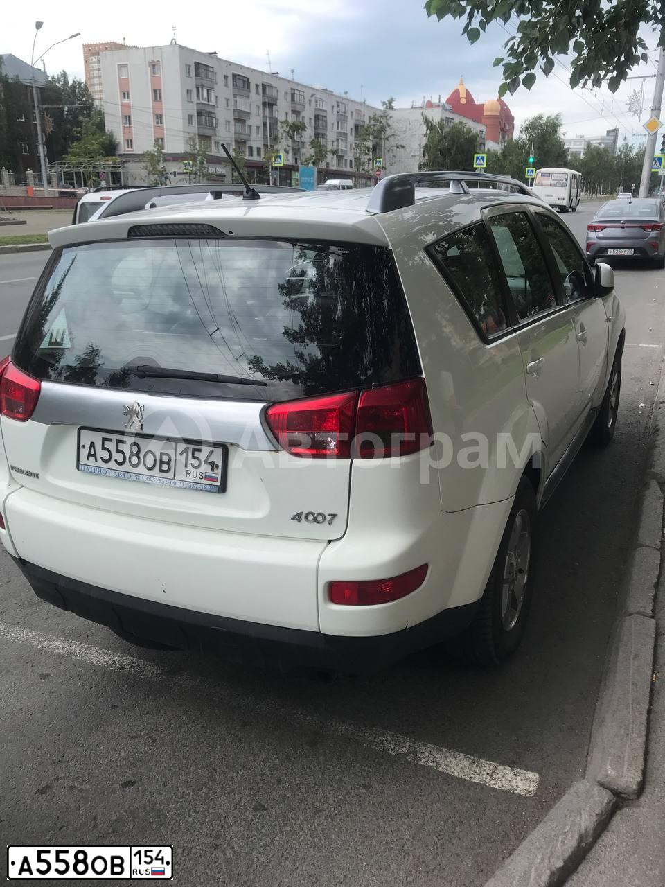 Фото автомобиля PEUGEOT 4007, 2011 — госномер А558ОВ154. Цвет: БЕЛЫЙ