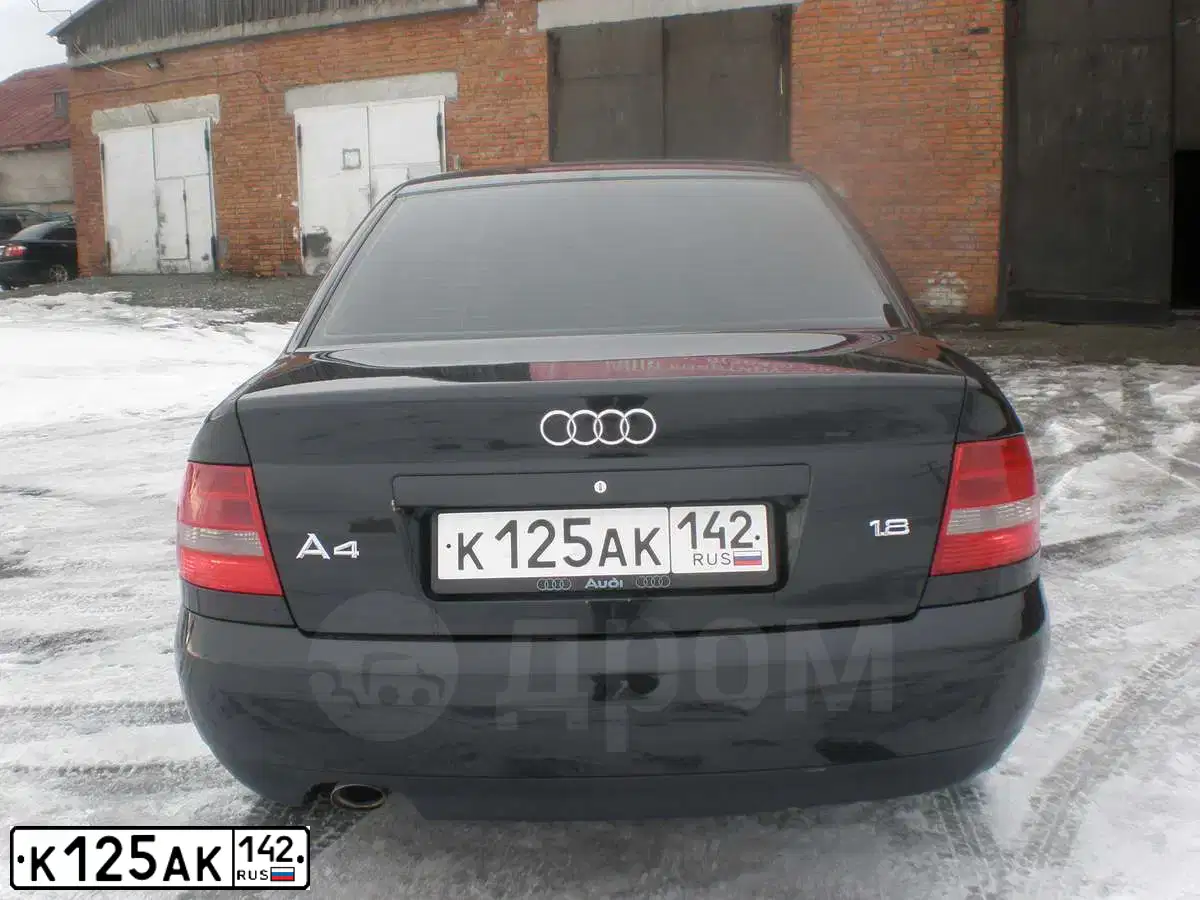 Фото автомобиля AUDI A4, 1999 — госномер М500РТ24. Цвет: ЧЕРНЫЙ