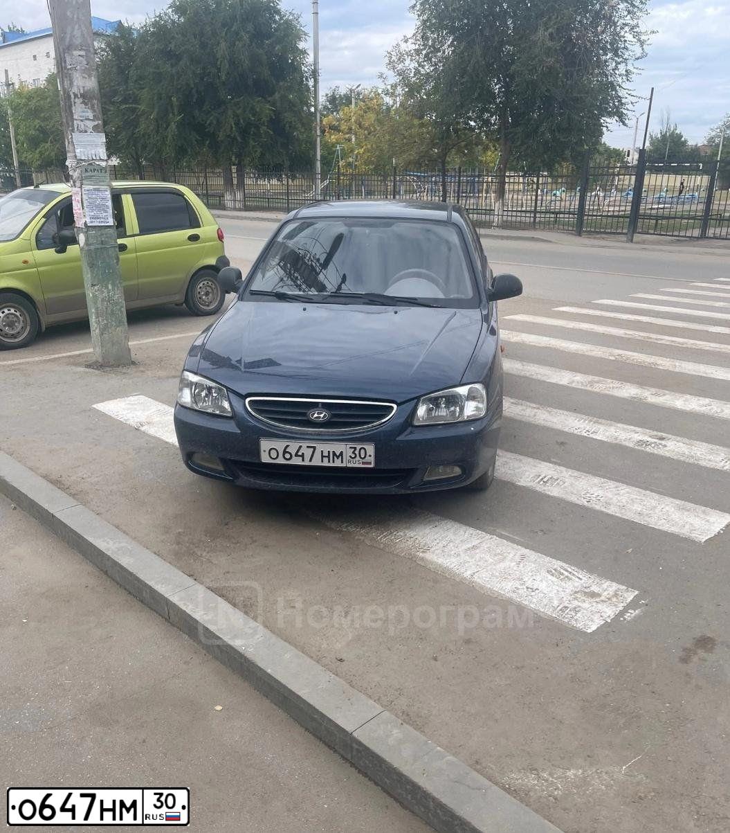 Фото автомобиля TAGAZ ACCENT, 2007 — госномер О647НМ30. Цвет: синий