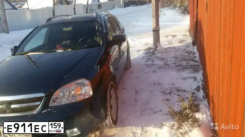 Фото автомобиля CHEVROLET LACETTI, 2008 — госномер Е911ЕС159. Цвет: ТЕМНО СИНИЙ