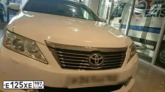 Фото автомобиля IZH 2126, 2002 — госномер Е125ХЕ197. Цвет: КРАСНЫЙ ТЕМНЫЙ